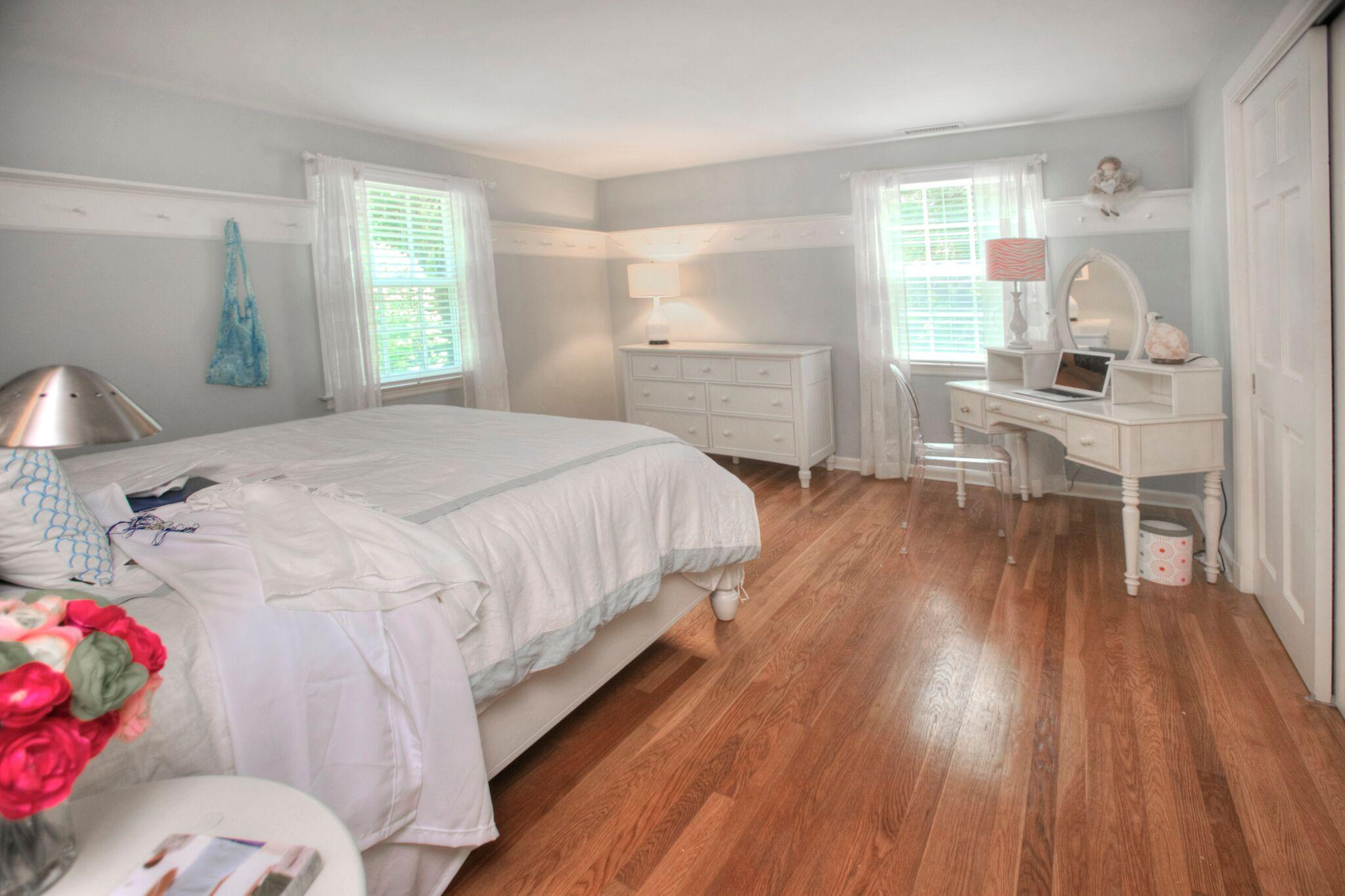 5 Haskell Lane Darien, CT 06820 - Photo 17 of 22 a bedroom with a bed and a window