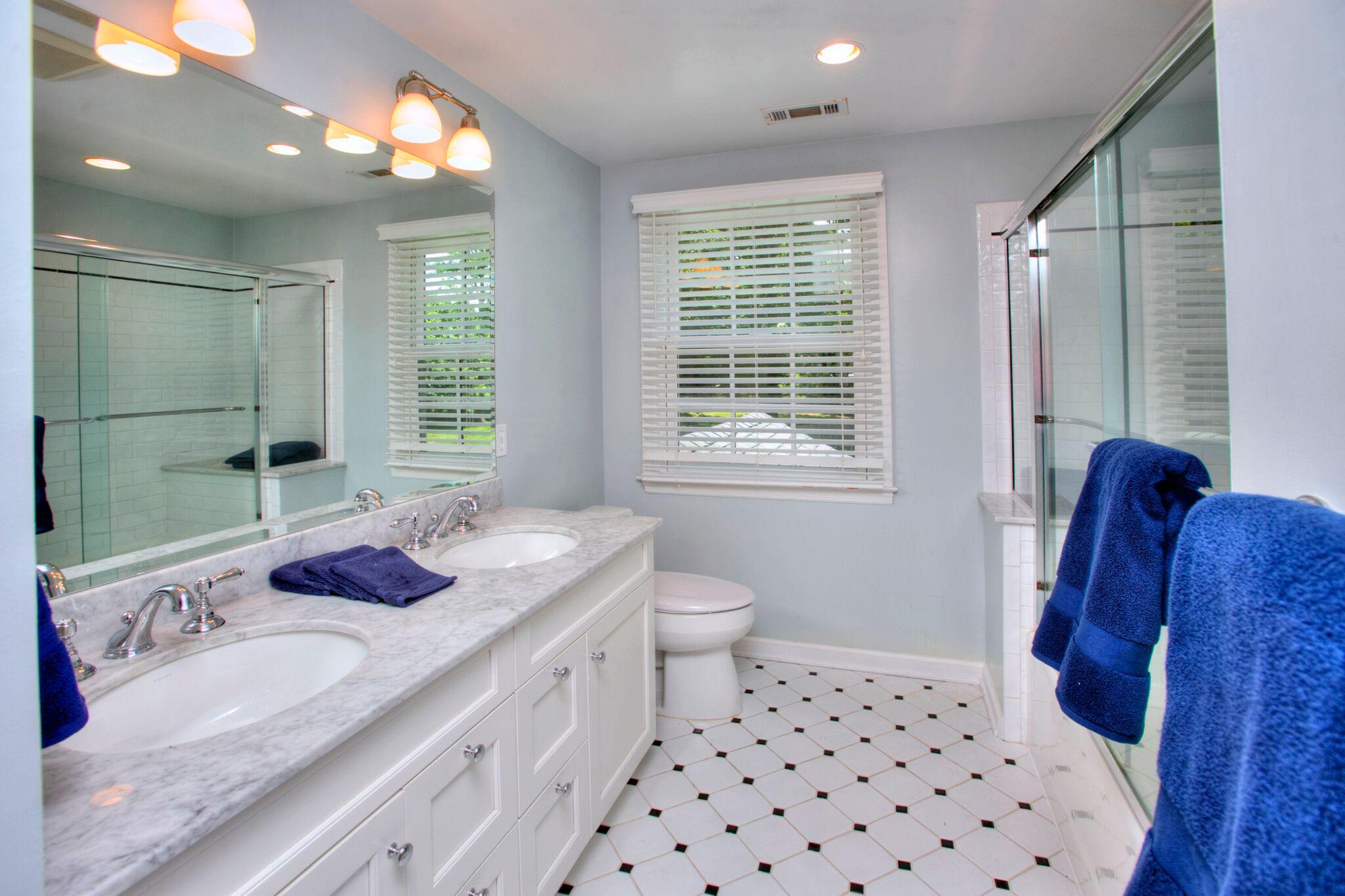 5 Haskell Lane Darien, CT 06820 - Photo 18 of 22 a bathroom with a granite countertop sink a toilet a mirror and shower