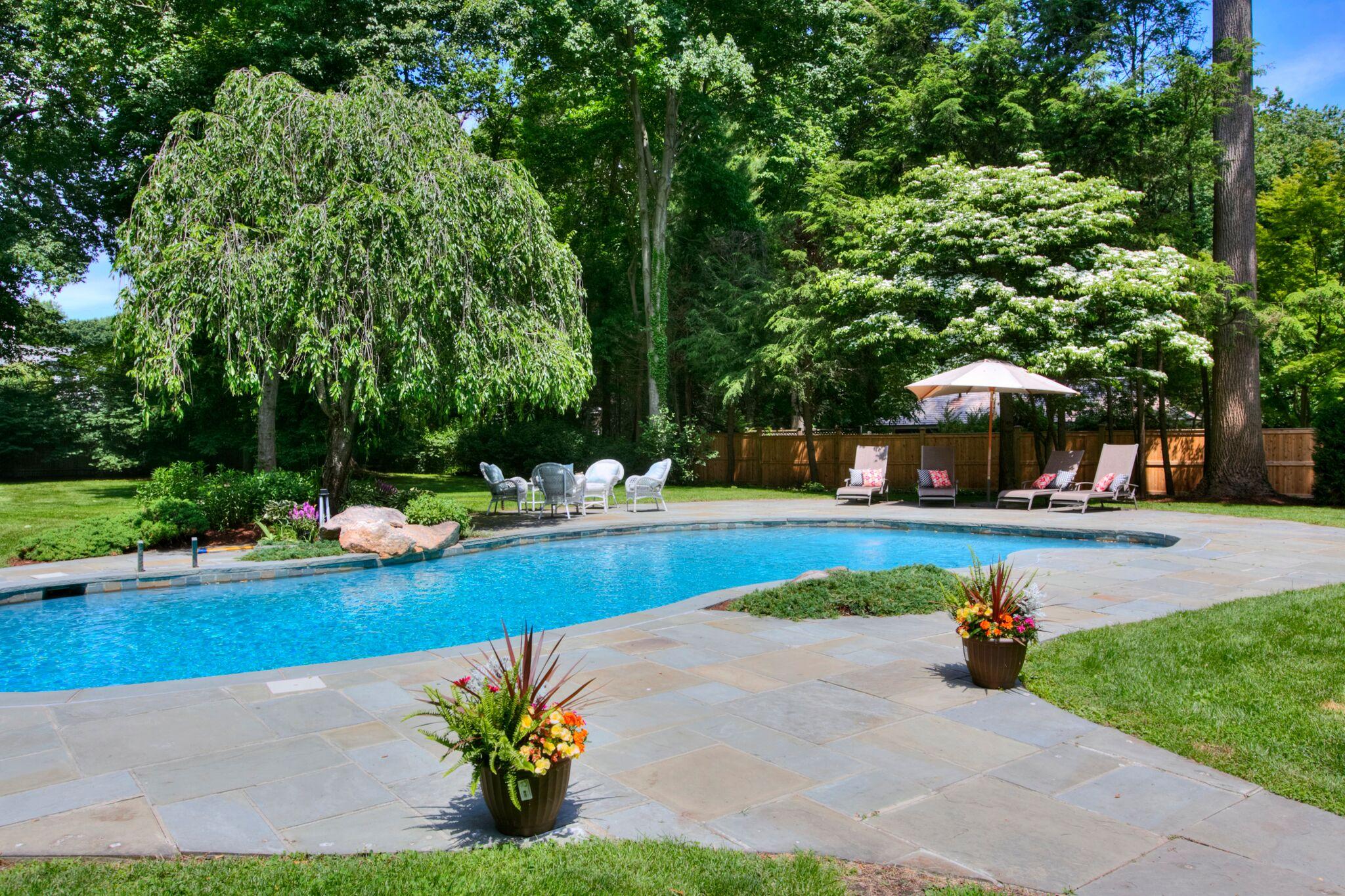 5 Haskell Lane Darien, CT 06820 - Photo 22 of 22 a view of a house with garden and a trees