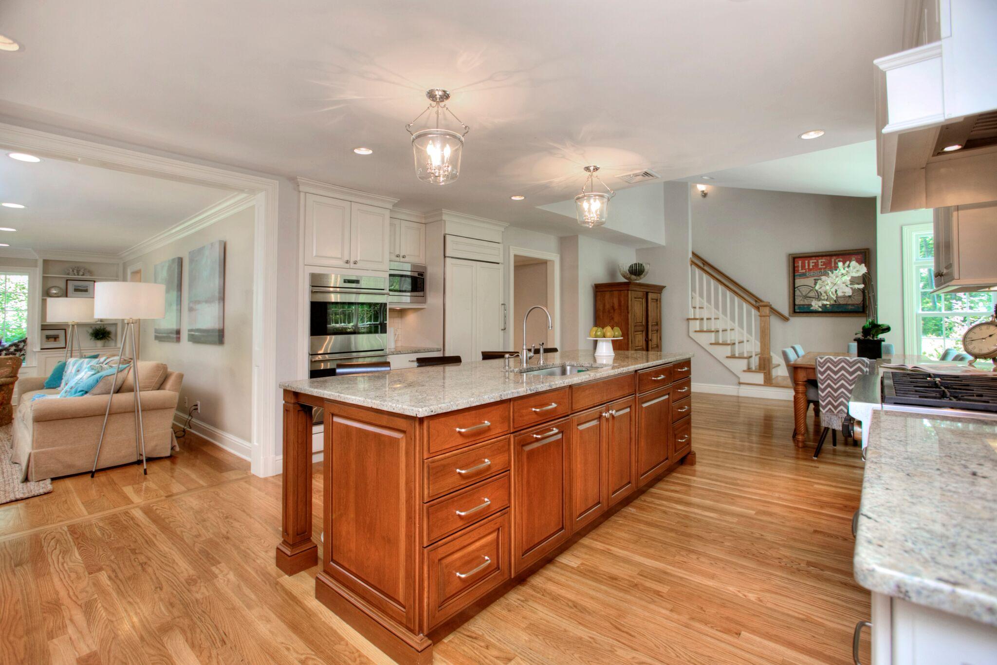 5 Haskell Lane Darien, CT 06820 - Photo 8 of 22 a large kitchen with stainless steel appliances kitchen island granite countertop a large counter top and breakfast area