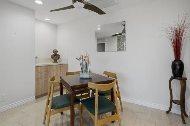 a bedroom with a bed and a chair