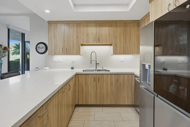 a kitchen with a stove and a microwave