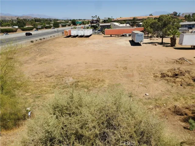 an outdoor space with lots of trees in the background