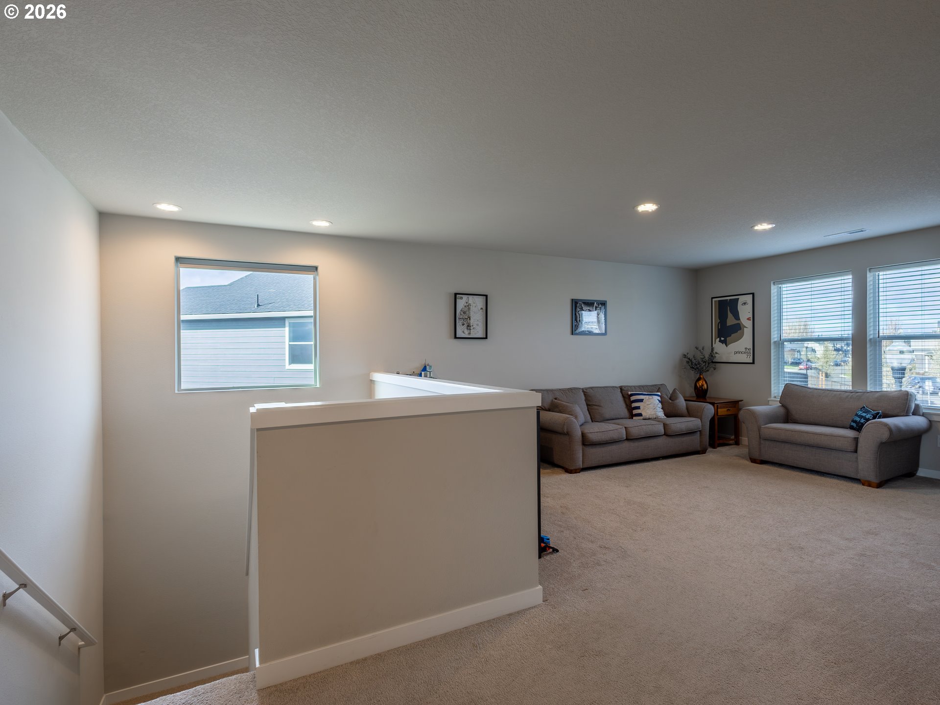 8827 North 1st Circle Ridgefield, WA 98642 - Photo 14 of 38 a living room with furniture and a window