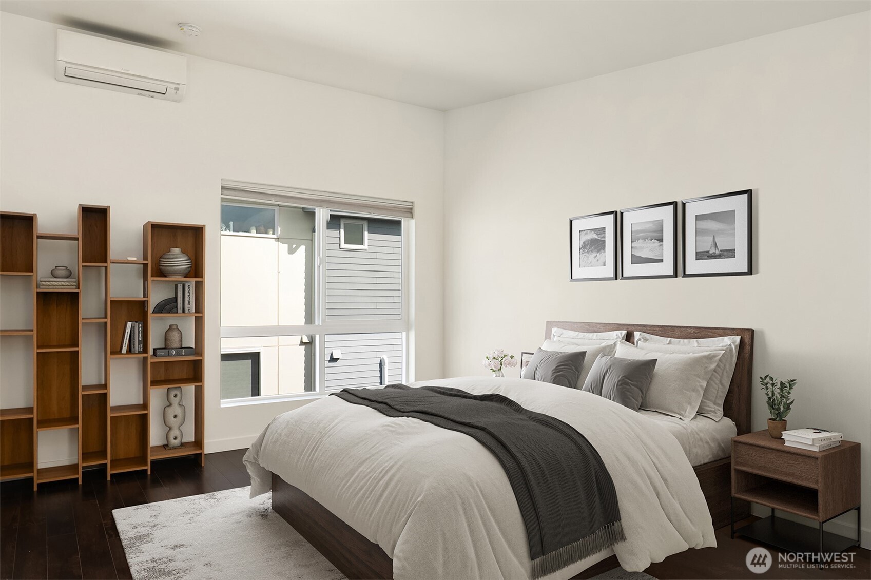 3631 Courtland Place South, Unit B Seattle, WA 98144 - Photo 19 of 27 a bedroom with a large bed and a chandelier