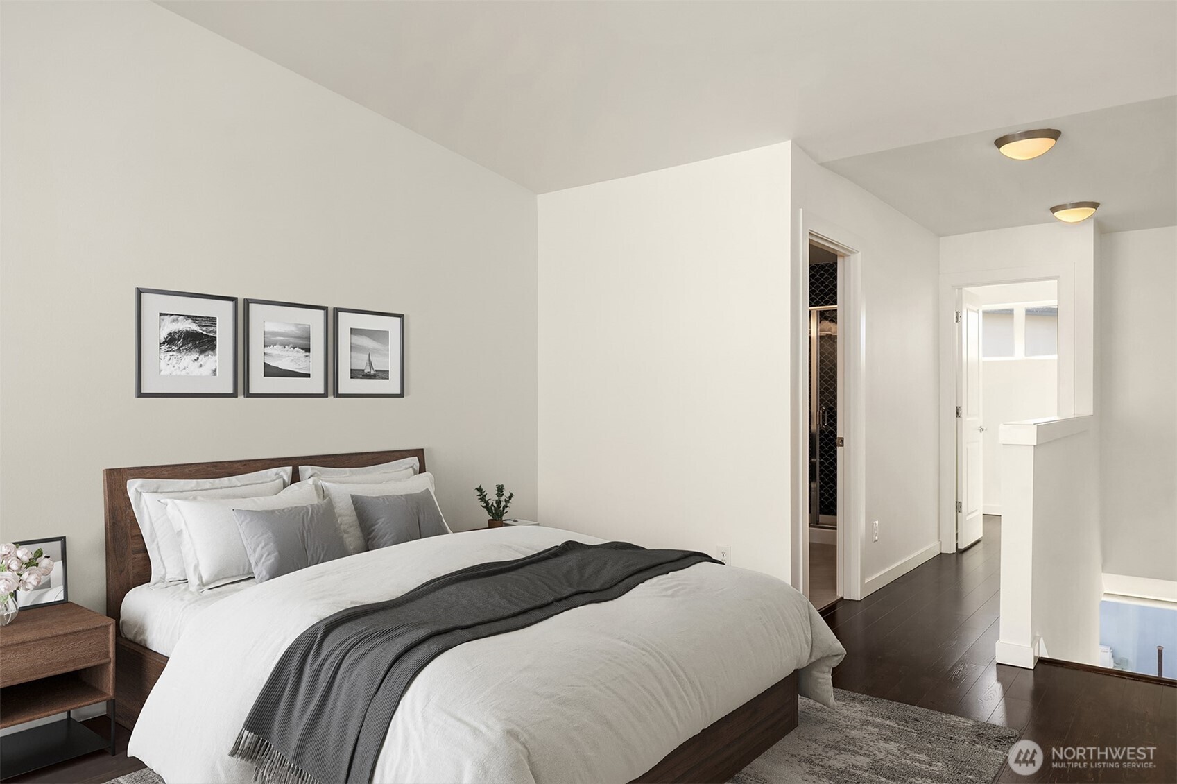 3631 Courtland Place South, Unit B Seattle, WA 98144 - Photo 20 of 27 a bedroom with bed and wooden floor