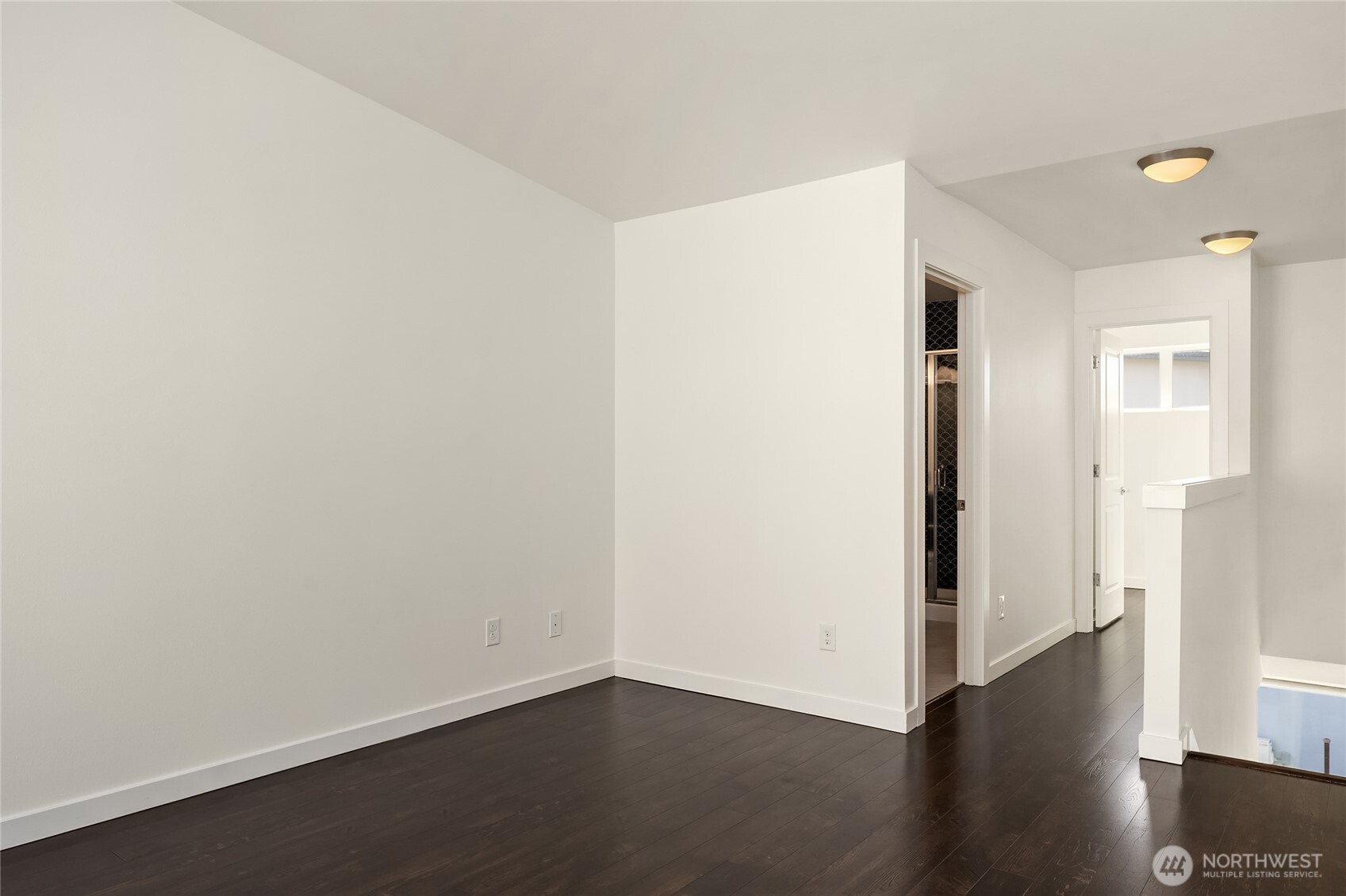 3631 Courtland Place South, Unit B Seattle, WA 98144 - Photo 22 of 27 a view of a room with wooden floor