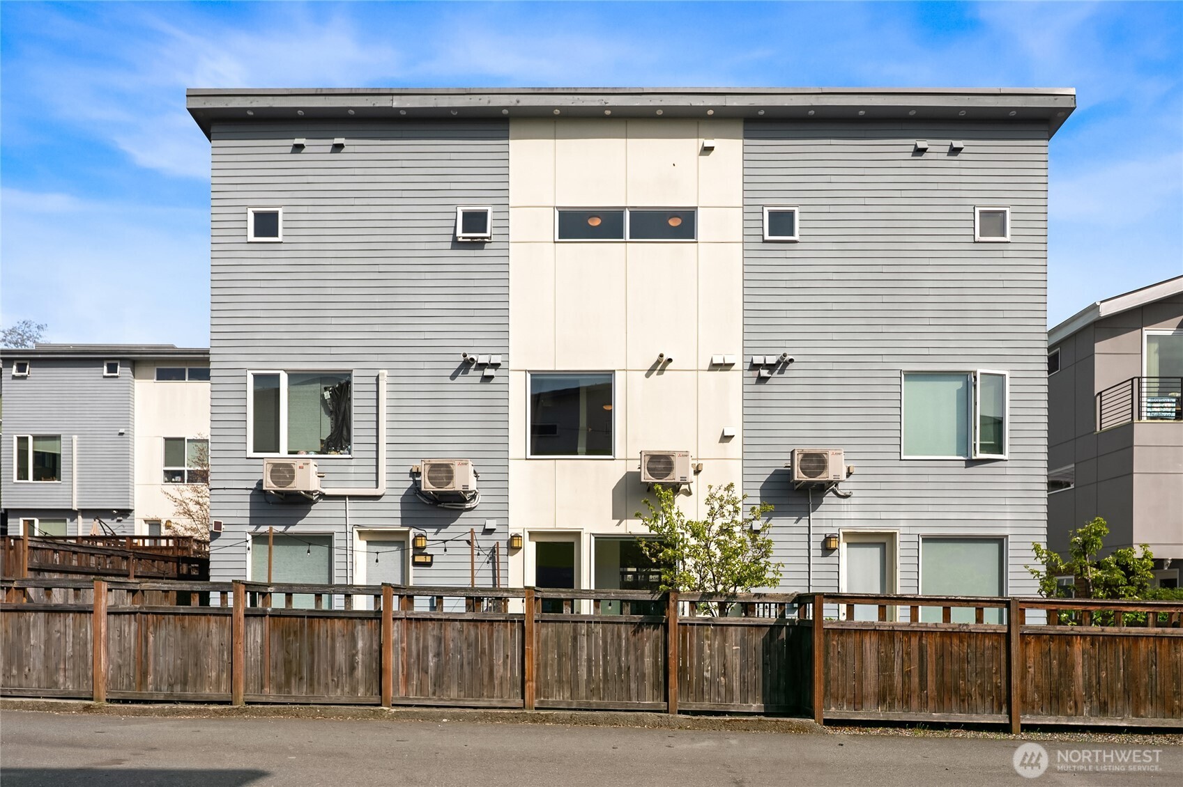 3631 Courtland Place South, Unit B Seattle, WA 98144 - Photo 26 of 27 a front view of multiple houses with deck