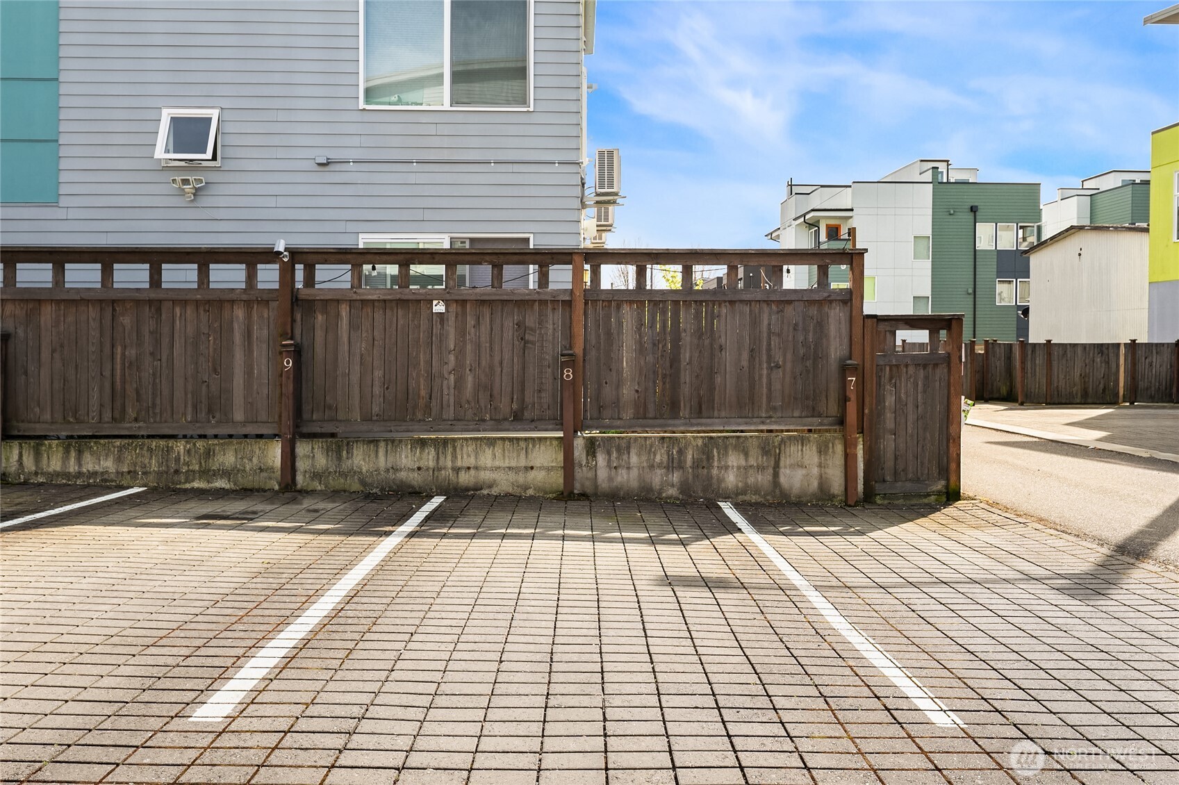 3631 Courtland Place South, Unit B Seattle, WA 98144 - Photo 27 of 27 a view of a brick wall with a balcony
