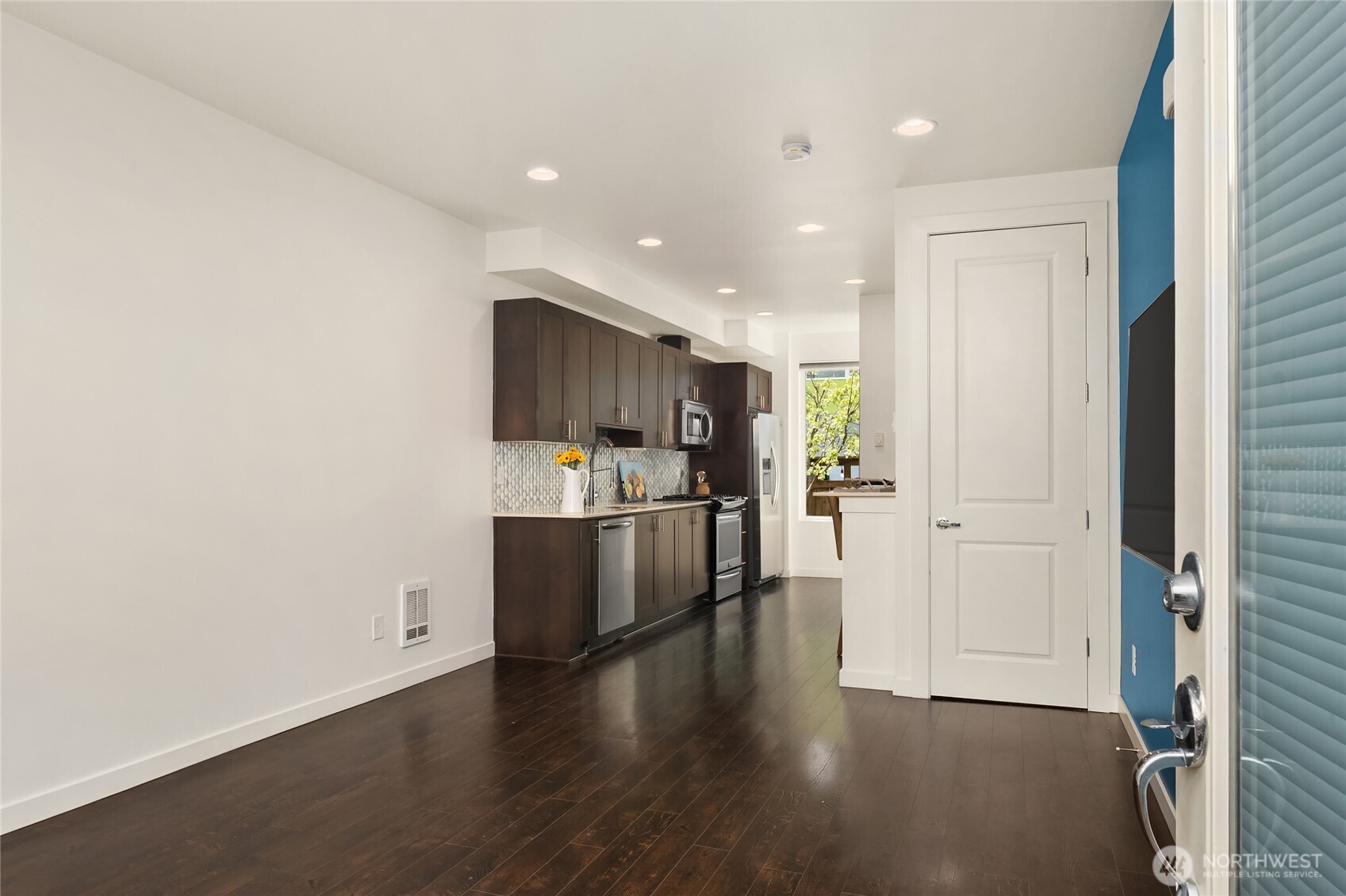 3631 Courtland Place South, Unit B Seattle, WA 98144 - Photo 5 of 27 a view of a kitchen with a sink and wooden floor