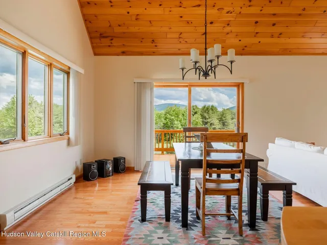 a view of a livingroom with furniture window and outside view