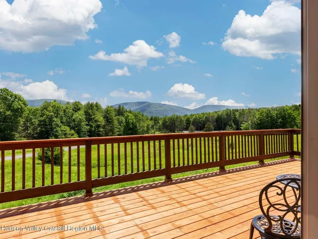 a patio with table and chairs