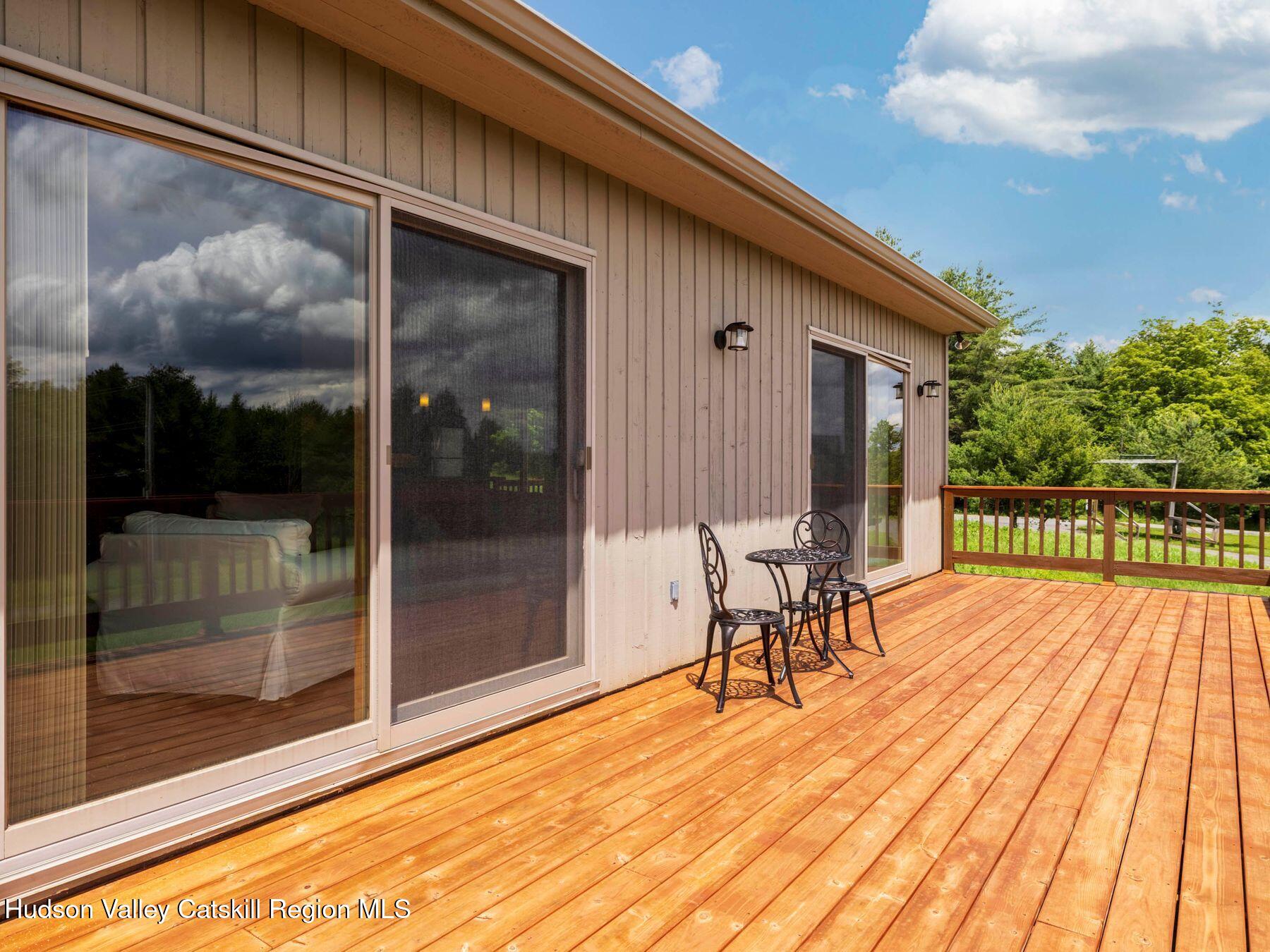 5147 Rte 23c Jewett, NY 12444 - Photo 21 of 54 a patio with table and chairs