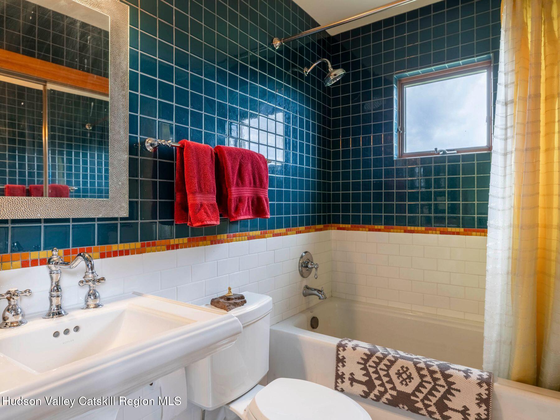 5147 Rte 23c Jewett, NY 12444 - Photo 29 of 54 a bathroom with a sink and a bathtub