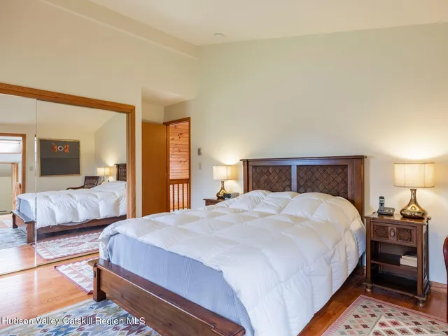 a white toilet sitting next to a bathroom sink and a granite floor