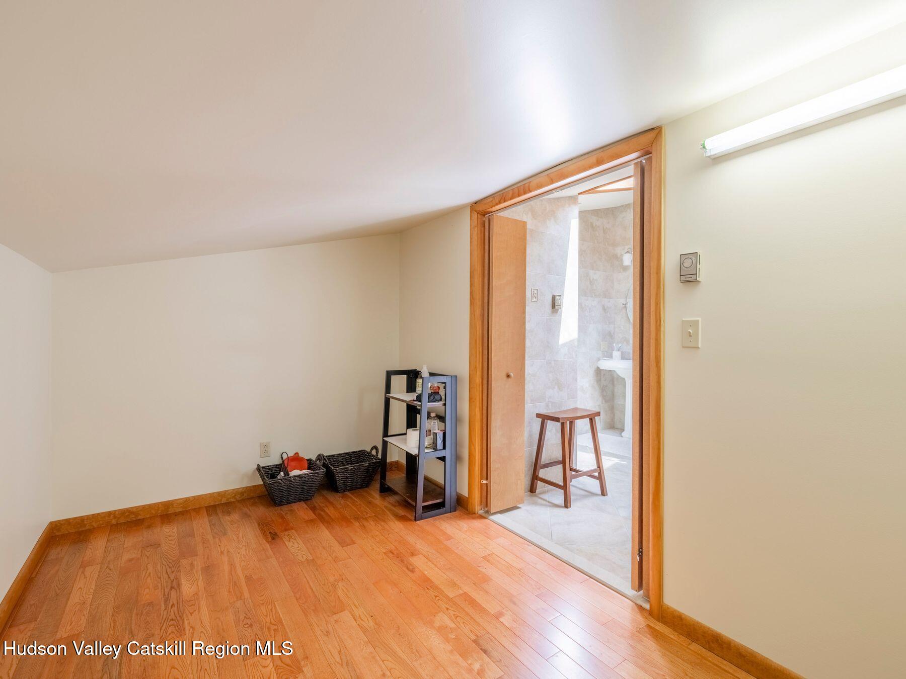 5147 Rte 23c Jewett, NY 12444 - Photo 37 of 54 a view of a livingroom with wooden floor and a couch