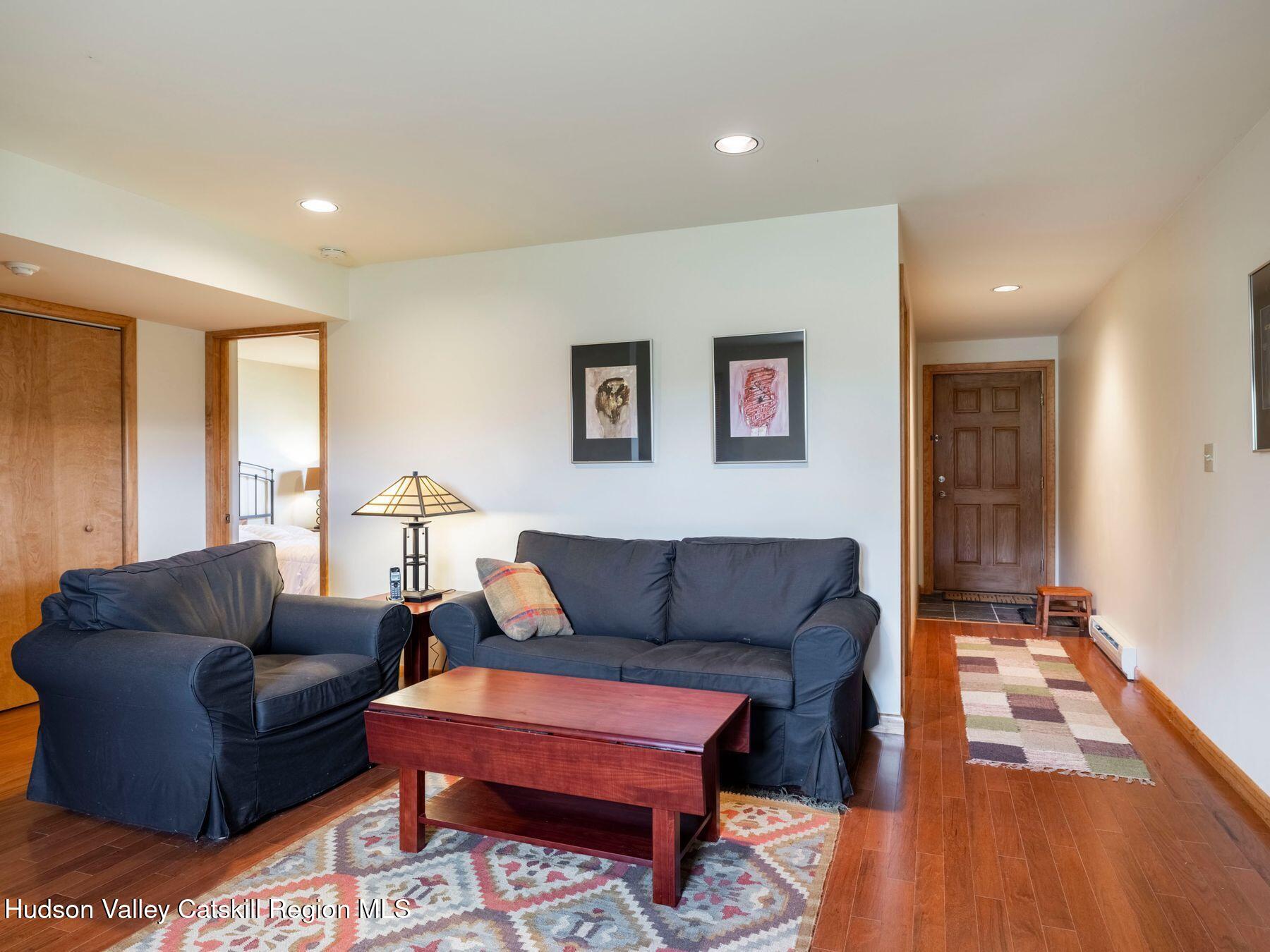 5147 Rte 23c Jewett, NY 12444 - Photo 42 of 54 a living room with furniture and a wooden floor