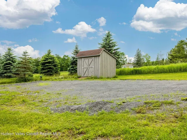 a house view with a garden space