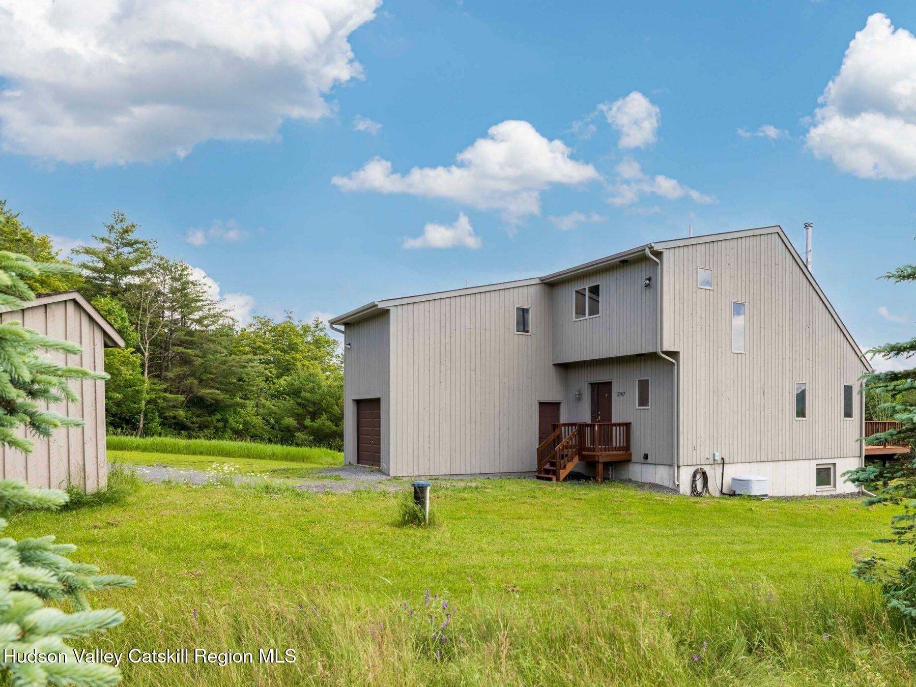 5147 Rte 23c Jewett, NY 12444 - Photo 5 of 54 a view of a back yard of the house