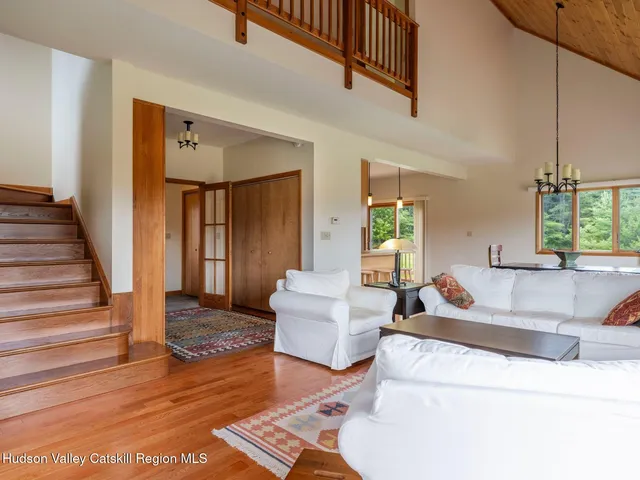 a living room with couches and a coffee table