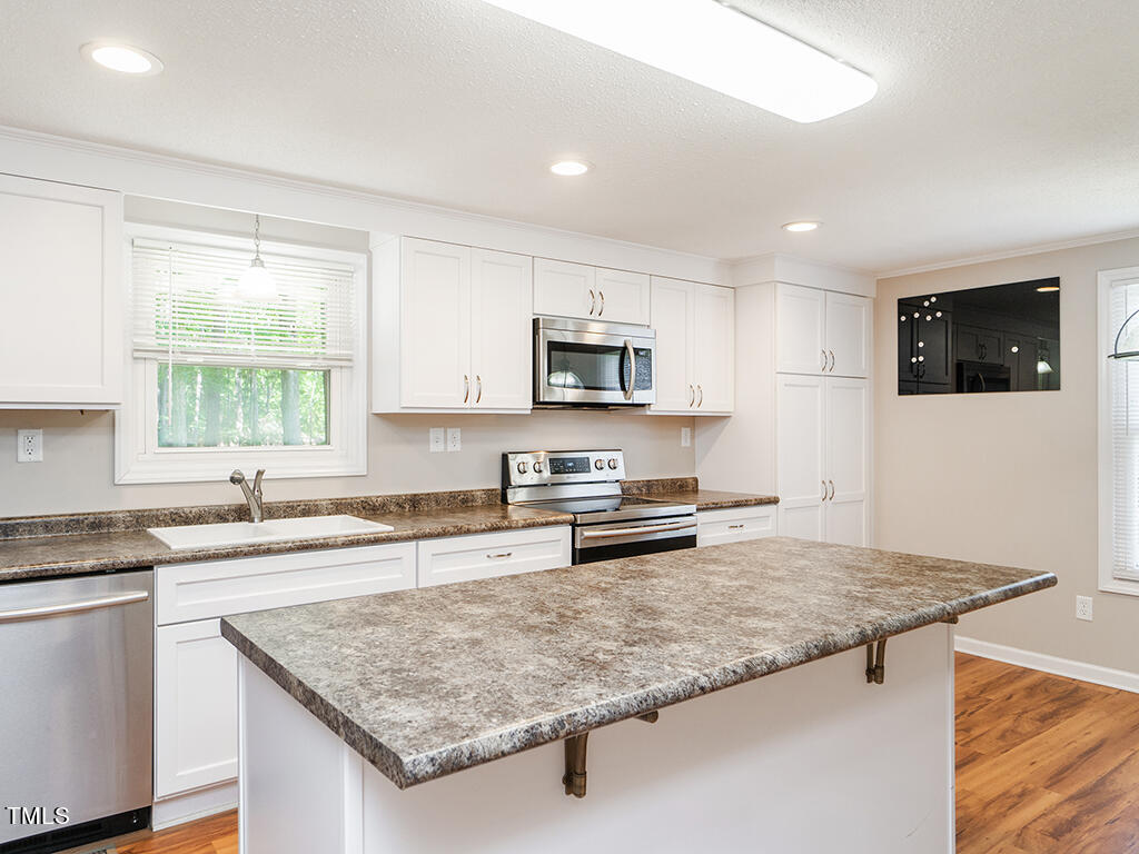 1310 Blacksmith Road Efland, NC 27243 - Photo 9 of 31 09 1310_BlacksmithRd Kitchen1_MLS