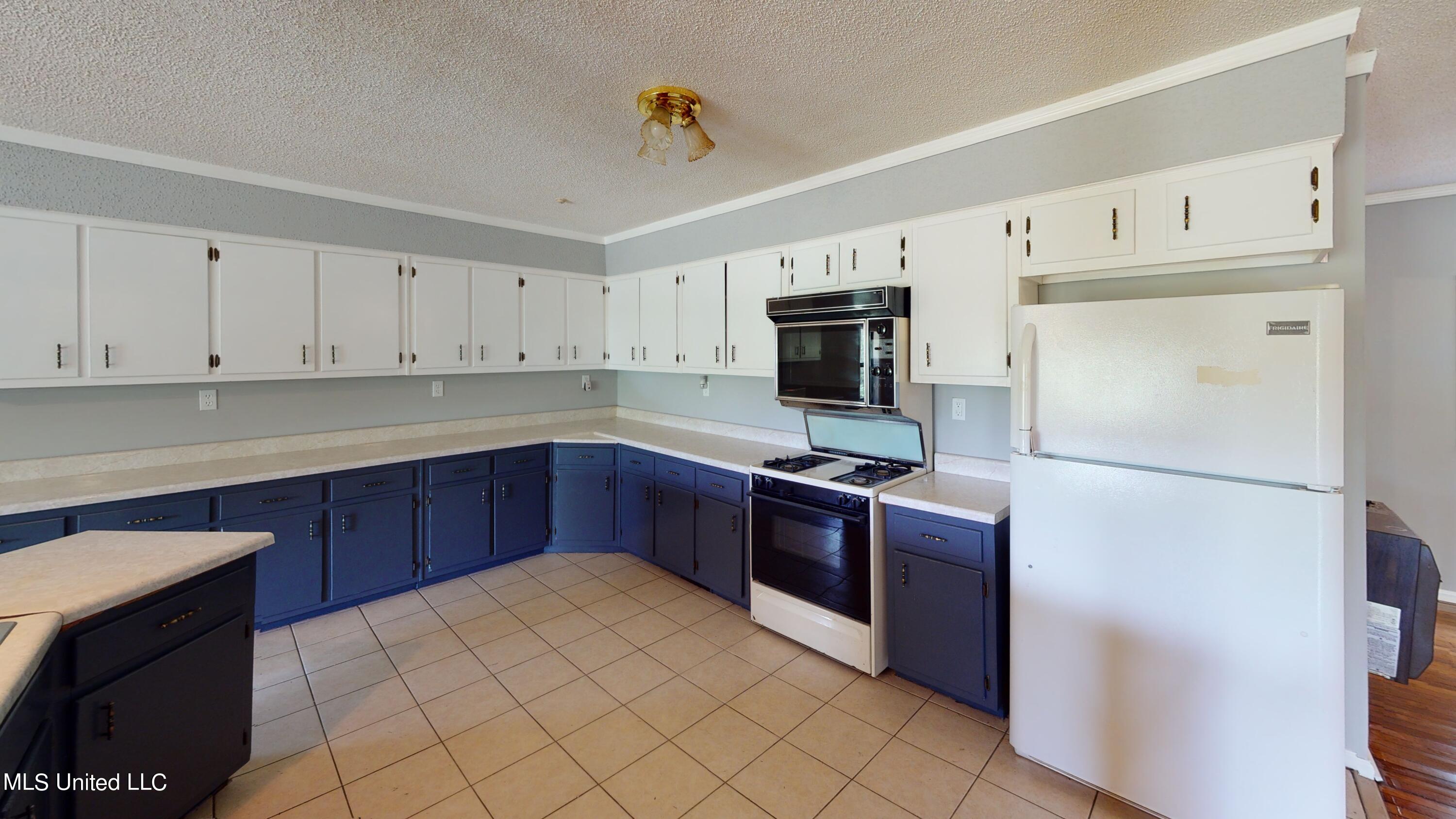 1915 Peavine Road Coldwater, MS 38618 - Photo 14 of 32 1915-Peavine-Rd-Kitchen(1)