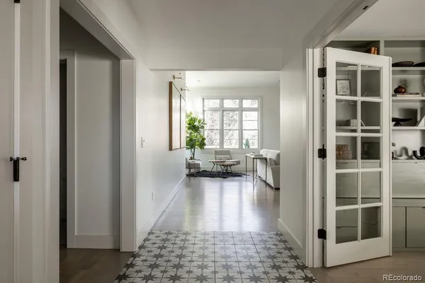 a living room with furniture and a rug