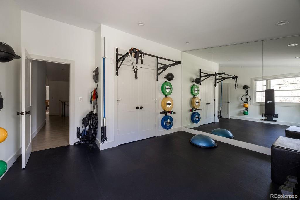 5151 West Wagon Trail Road Bow Mar, CO 80123 - Photo 34 of 50 a view of a room with gym equipment