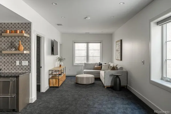 a view of livingroom with an empty room