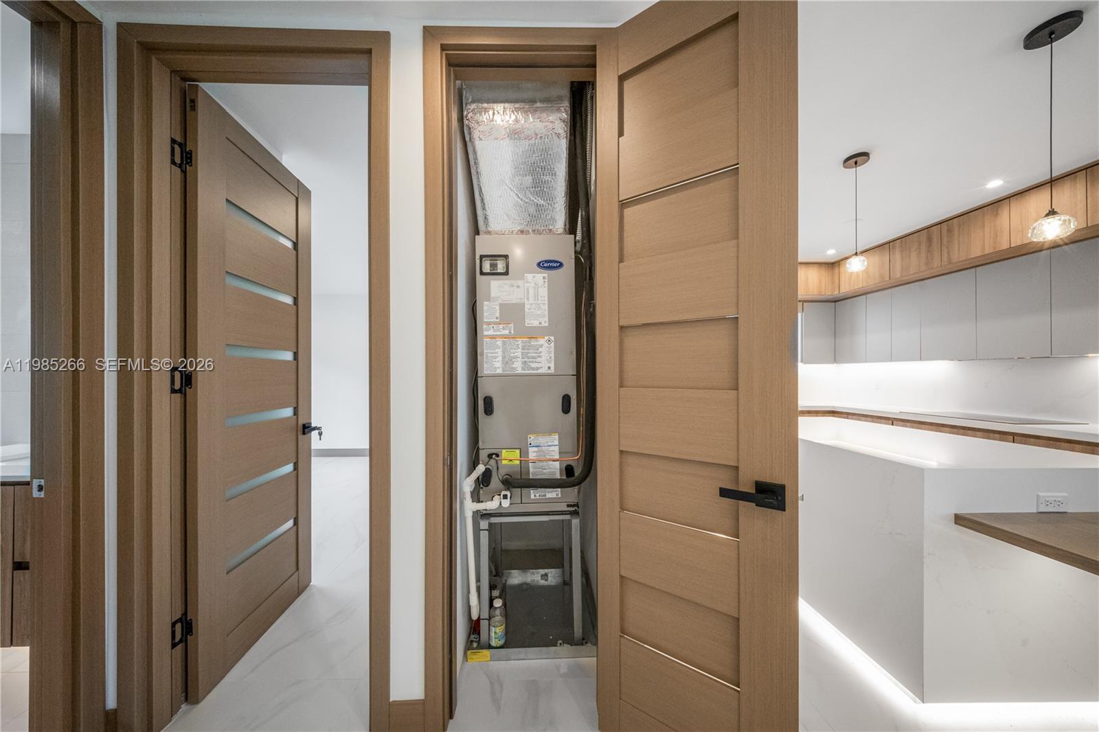 4241 Red Road Coral Gables, FL 33146 - Photo 18 of 51 a bathroom with a walk in closet and wooden floor