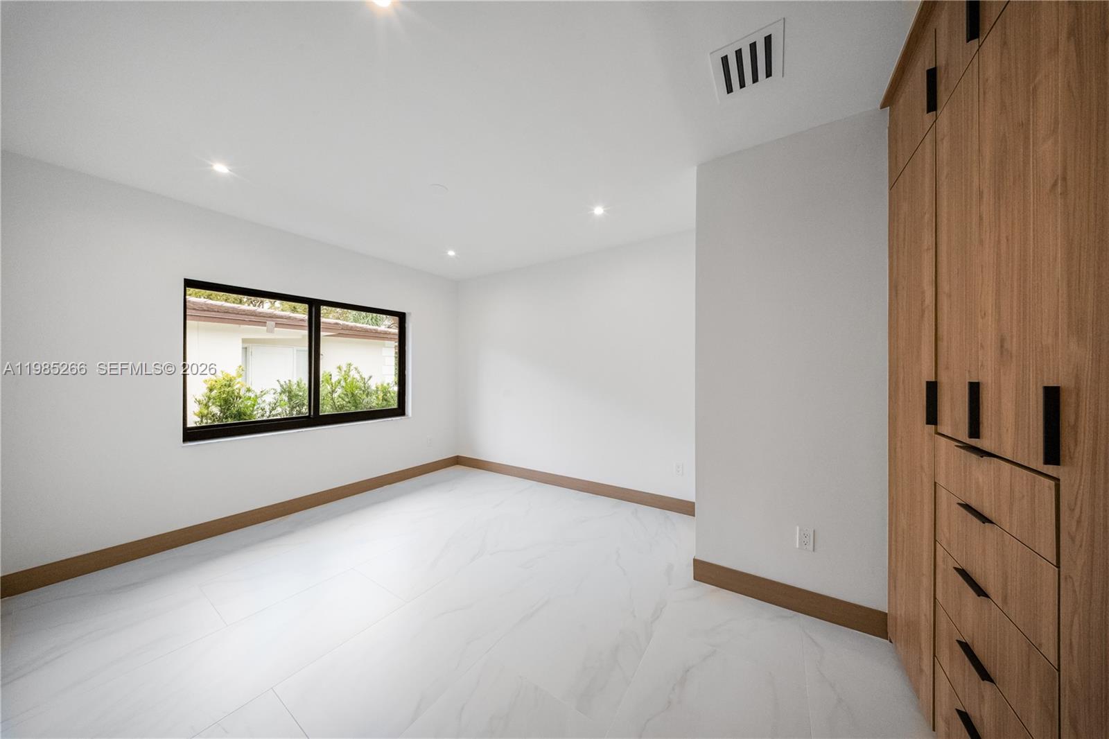 4241 Red Road Coral Gables, FL 33146 - Photo 19 of 51 a view of empty room with window