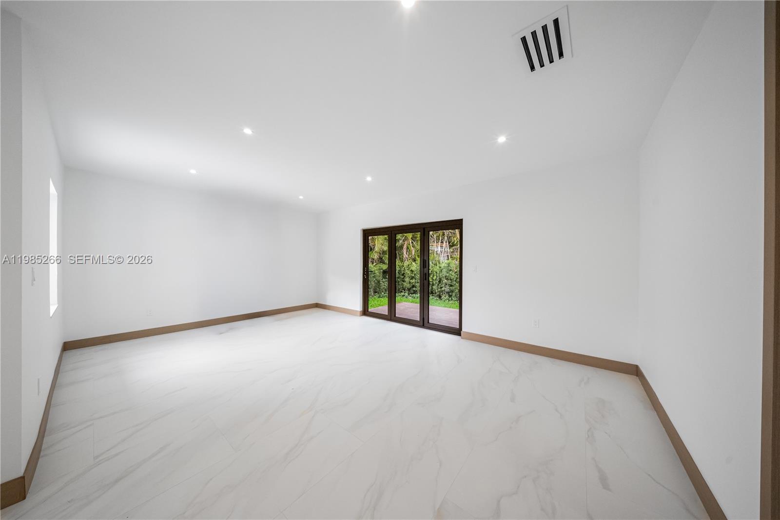 4241 Red Road Coral Gables, FL 33146 - Photo 24 of 51 a view of an empty room with a window