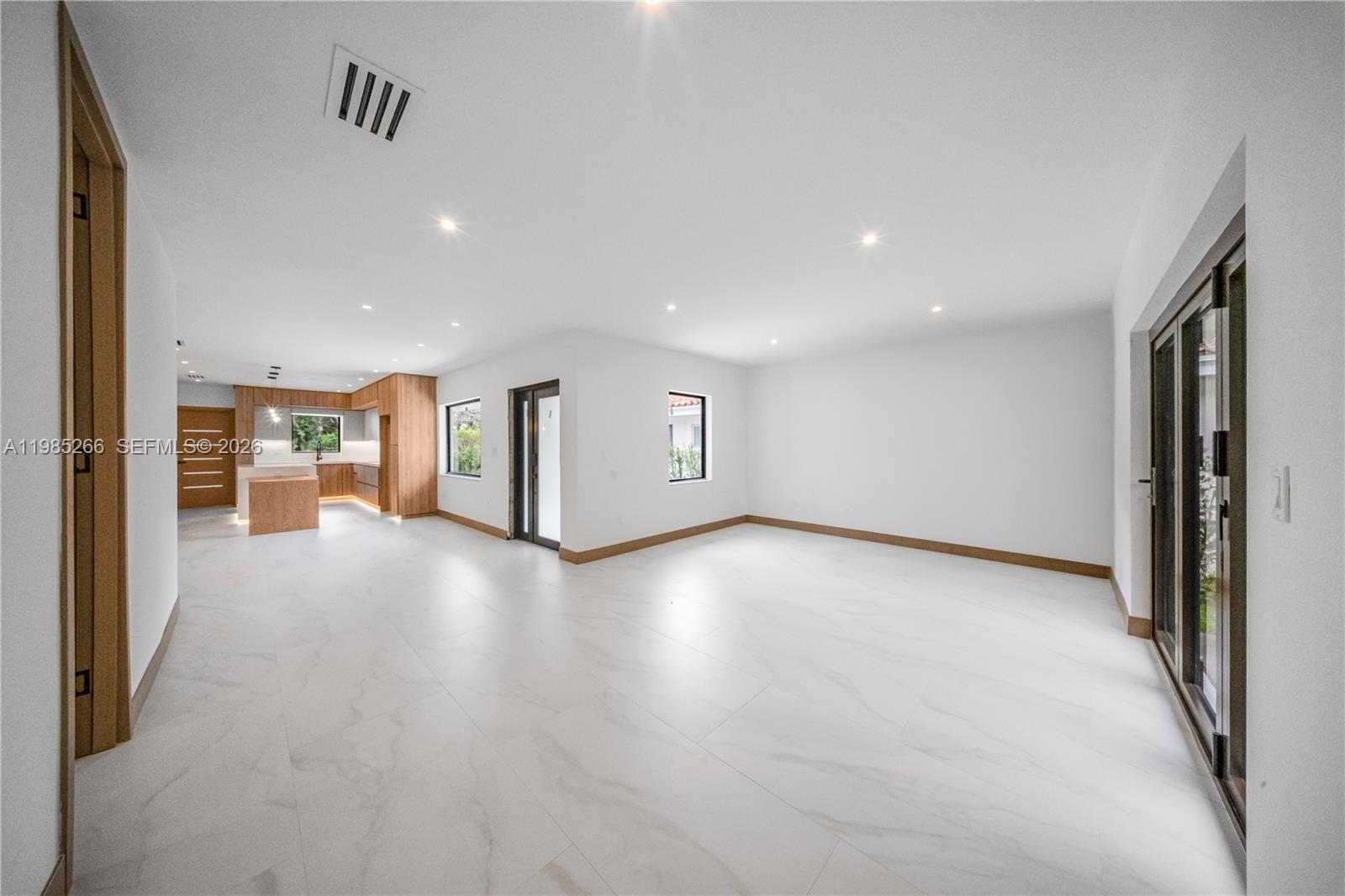4241 Red Road Coral Gables, FL 33146 - Photo 26 of 51 a view of a livingroom with wooden floor