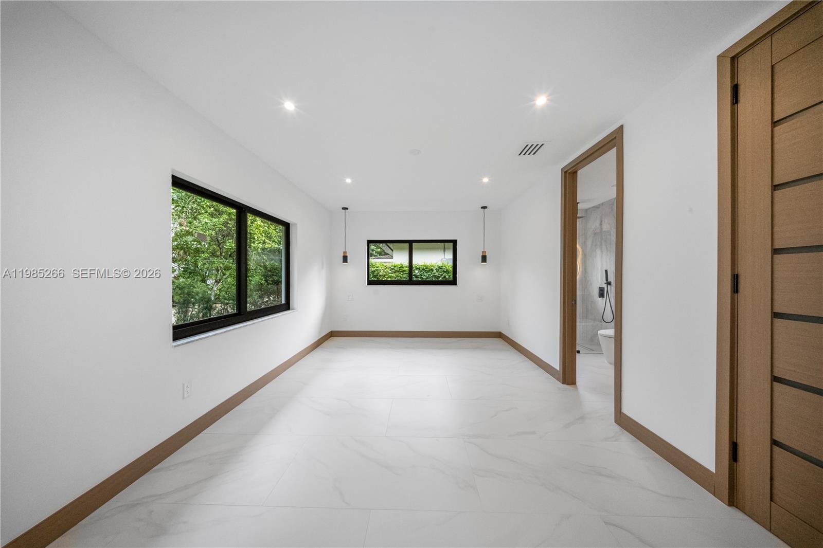 4241 Red Road Coral Gables, FL 33146 - Photo 28 of 51 a view of a big room with window