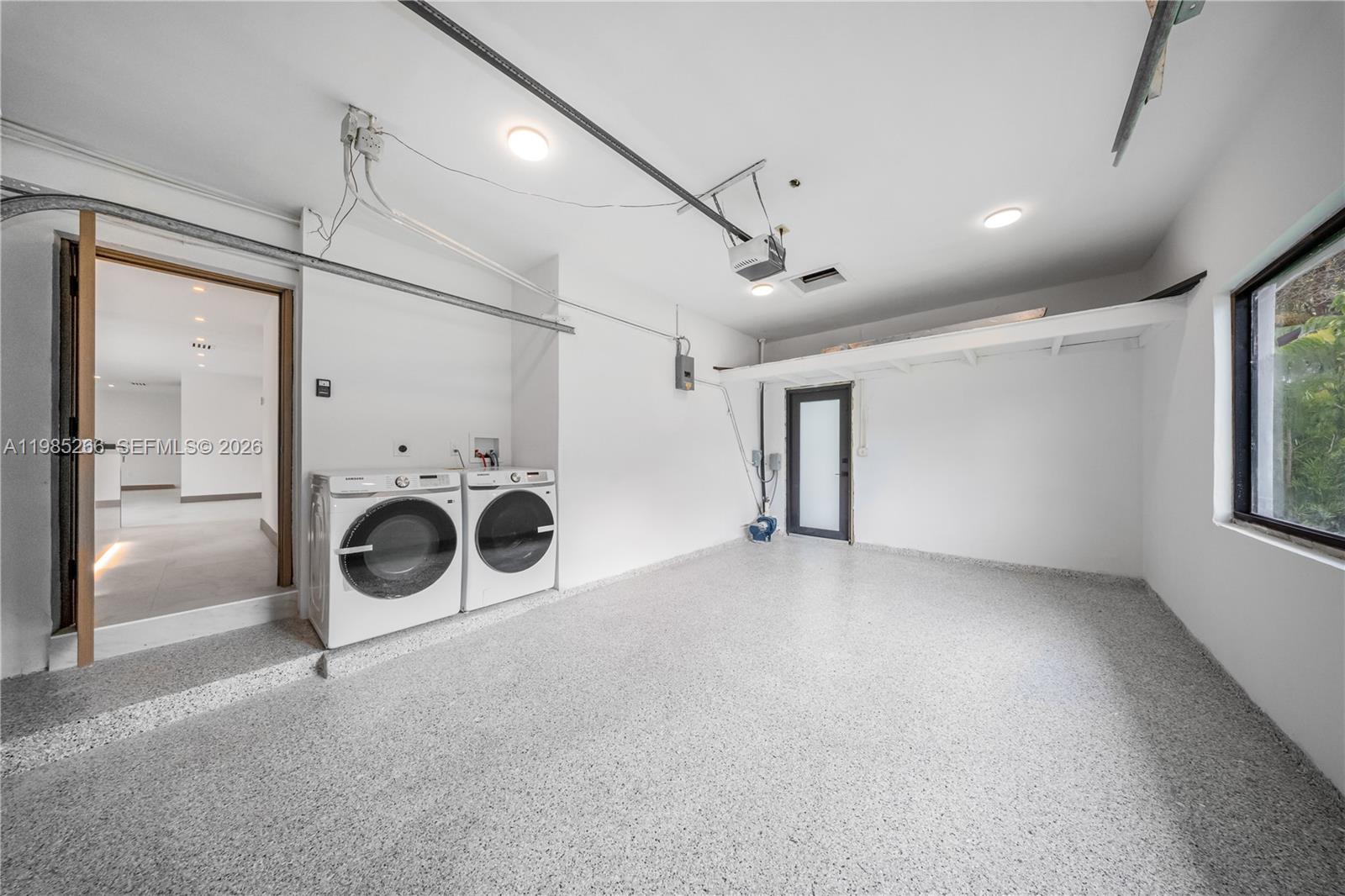 4241 Red Road Coral Gables, FL 33146 - Photo 34 of 51 a view of a storage & utility room with washer and dryer