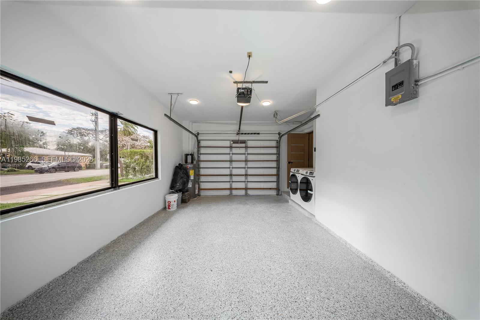 4241 Red Road Coral Gables, FL 33146 - Photo 35 of 51 a view of a livingroom with an empty space and chair