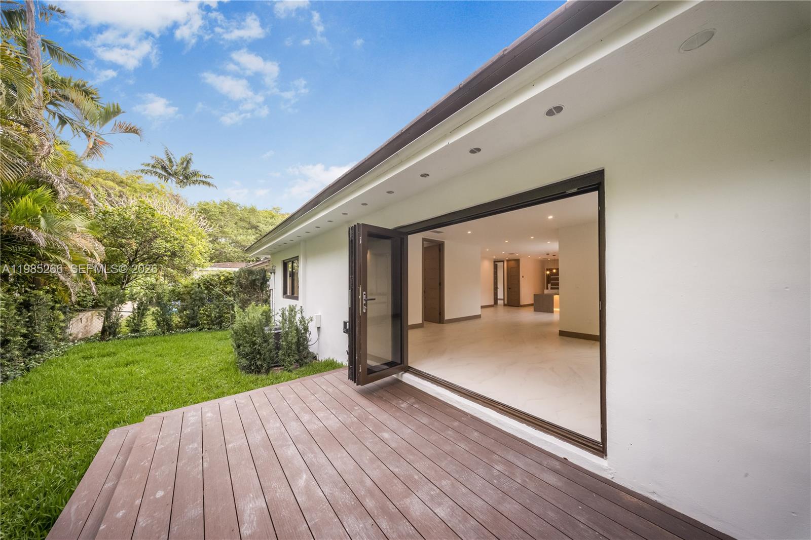 4241 Red Road Coral Gables, FL 33146 - Photo 38 of 51 a view of a house with backyard and garden