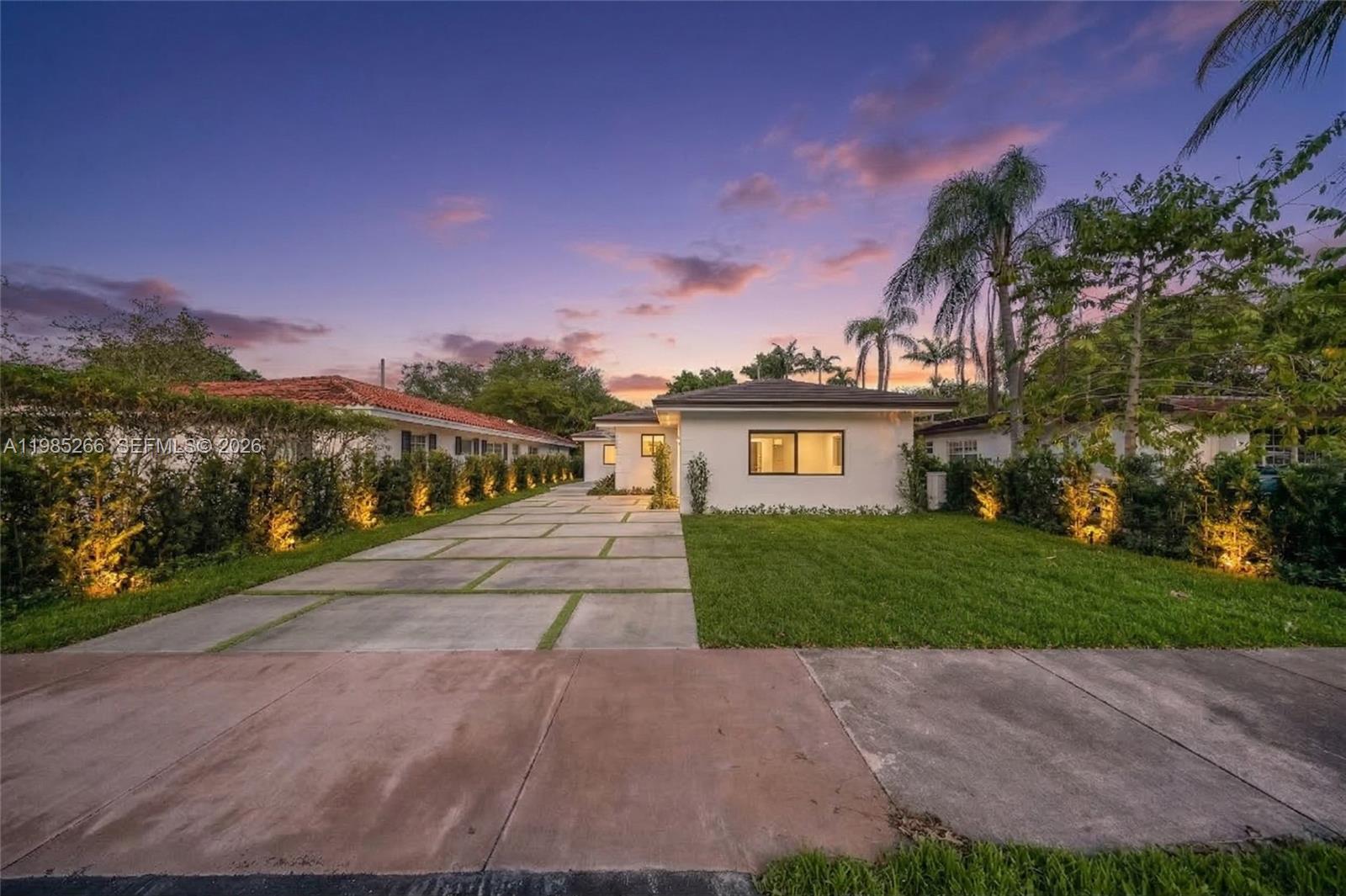 4241 Red Road Coral Gables, FL 33146 - Photo 4 of 51 a view of a street in front of a house