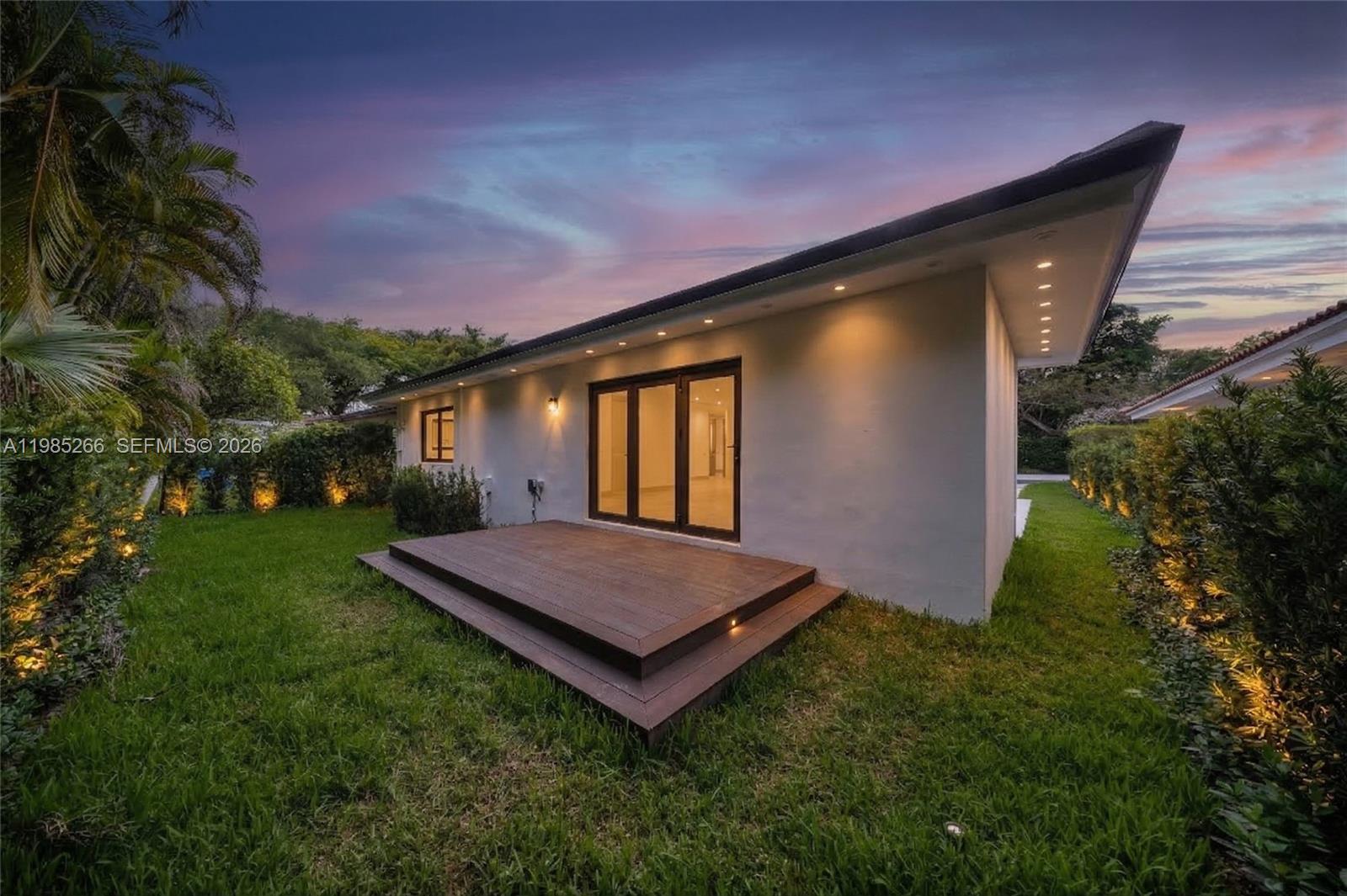 4241 Red Road Coral Gables, FL 33146 - Photo 41 of 51 a view of a backyard with plants and a patio