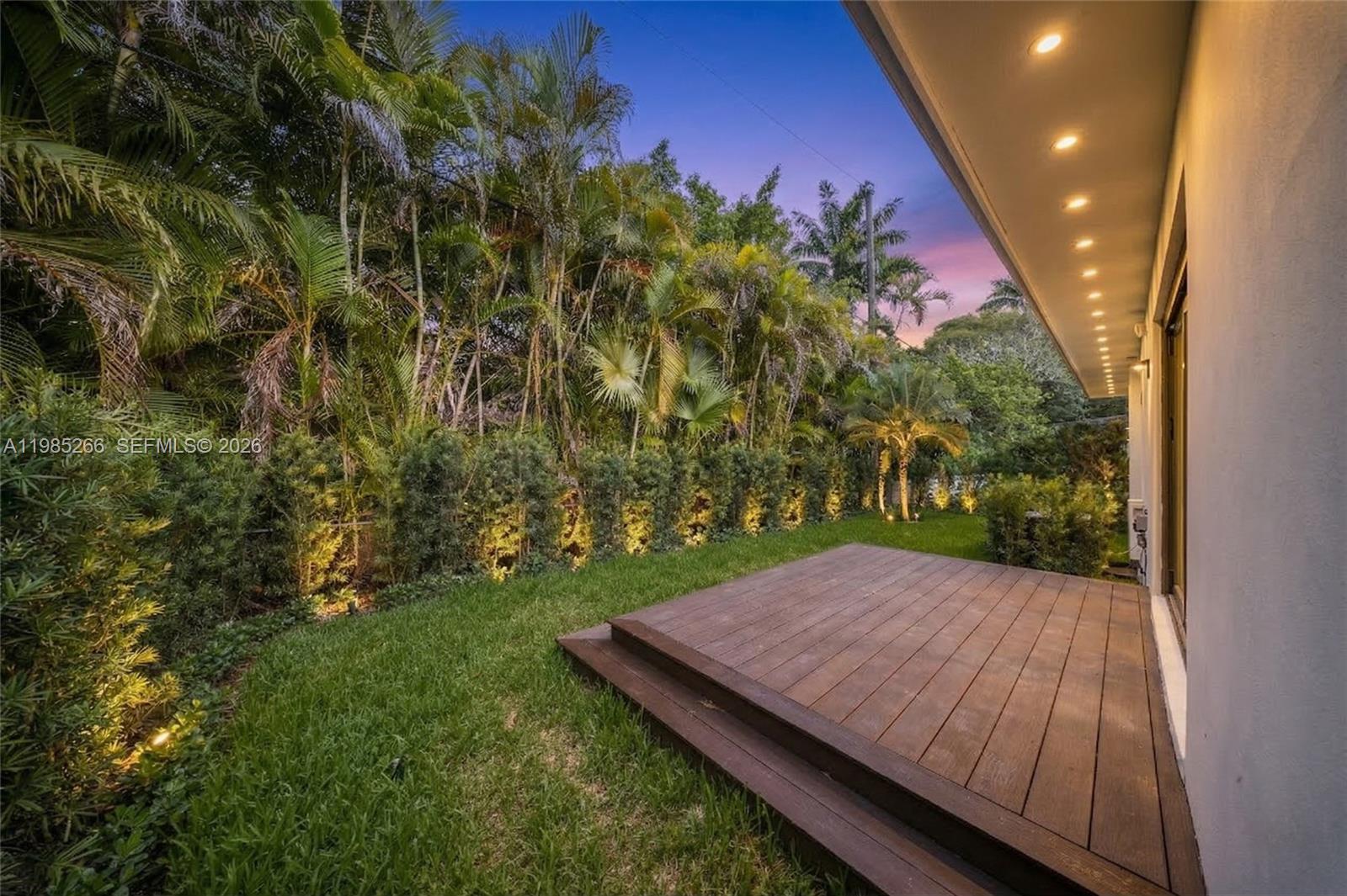 4241 Red Road Coral Gables, FL 33146 - Photo 42 of 51 a view of a backyard with a garden