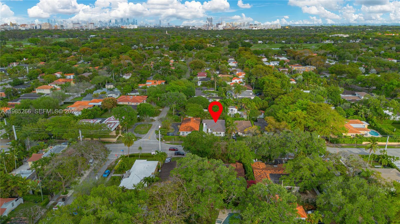 4241 Red Road Coral Gables, FL 33146 - Photo 47 of 51 an aerial view of residential houses with outdoor space and trees