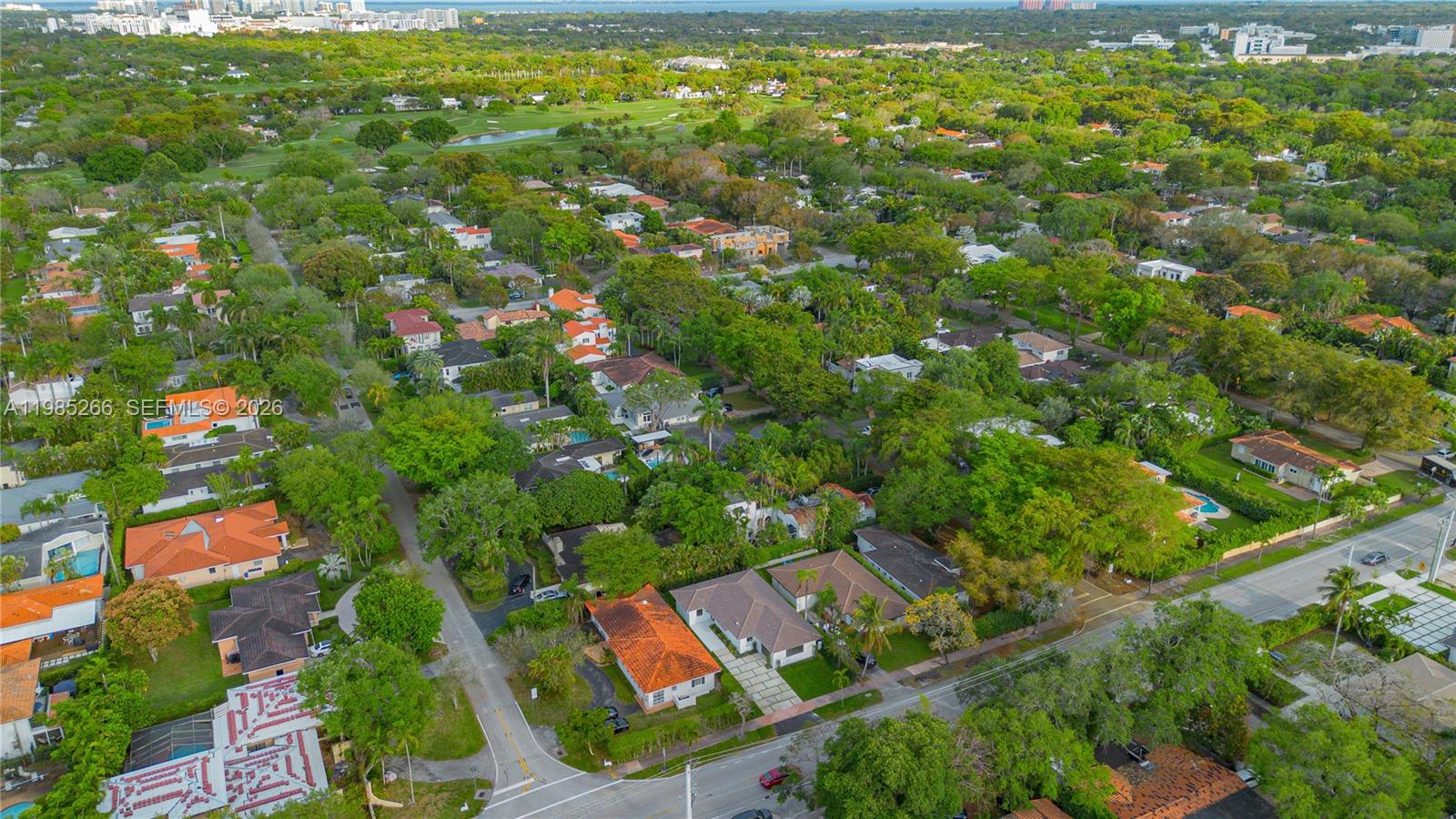 4241 Red Road Coral Gables, FL 33146 - Photo 51 of 51 an aerial view of residential houses with outdoor space and trees
