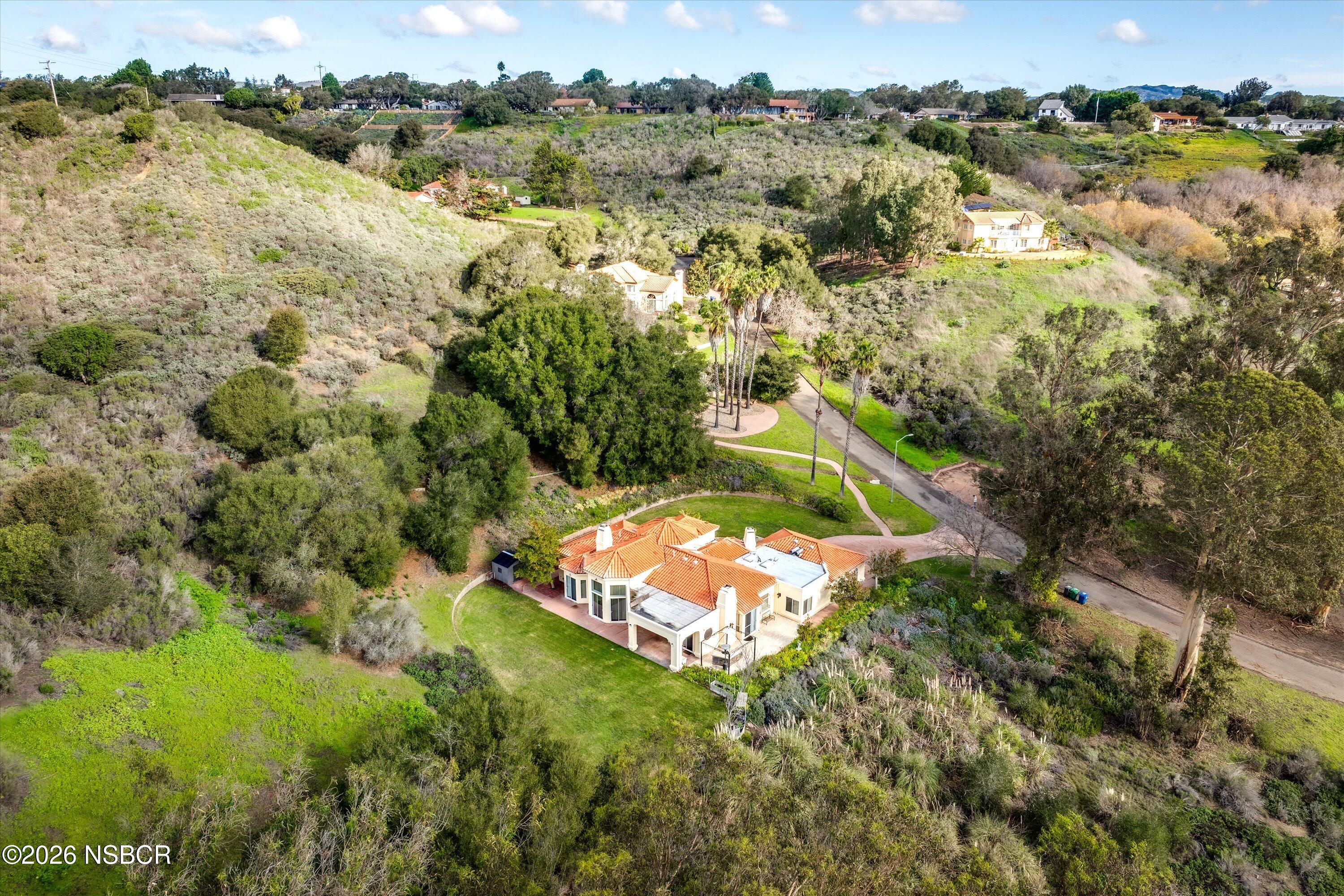 2655 Adobe Falls Road Lompoc, CA 93436 - Photo 51 of 51 an aerial view of a house with a yard