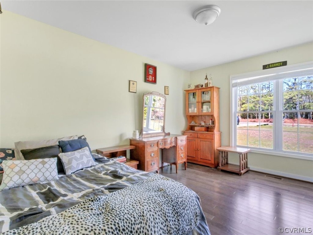 17196 Cabin Point Road Carson, VA 23830 - Photo 10 of 16 a bed room with a bed and a window