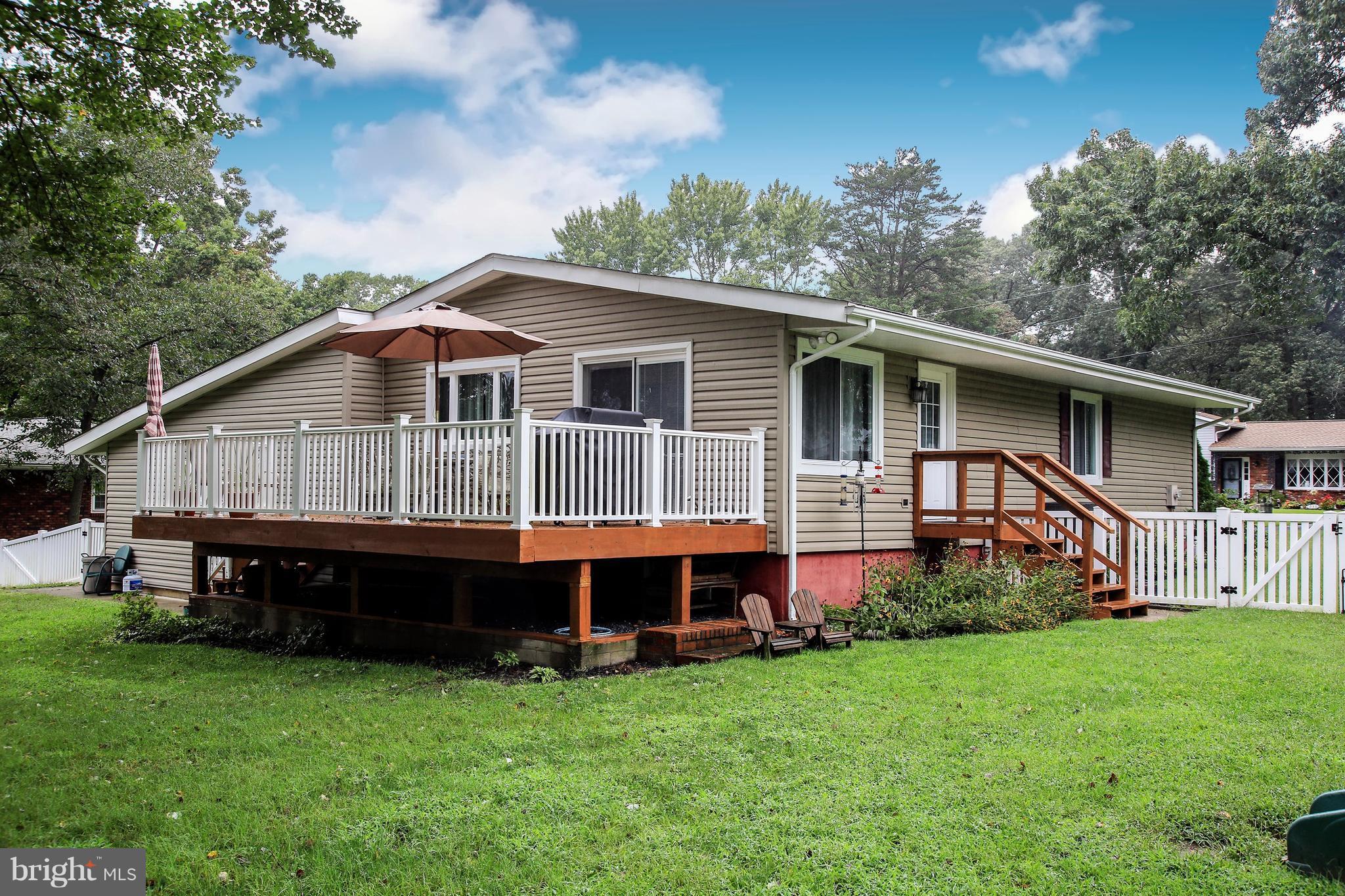 765 Evergreen Road Severn, MD 21144 - Photo 23 of 23 a front view of a house with garden
