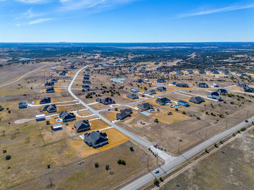 2077 Ellis Ridge Drive Weatherford, TX 76087 - Photo 14 of 19 an aerial view of residential houses with outdoor space