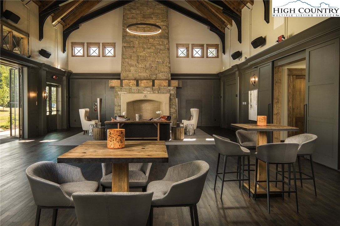 1241 Reynolds Parkway Boone, NC 28607 - Photo 29 of 48 a view of a dining room with furniture and chandelier