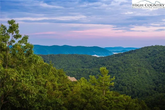 a view of lake with mountain
