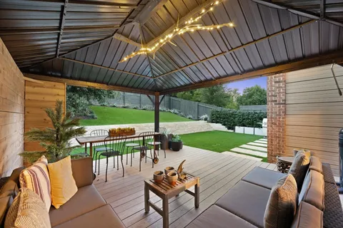 an aerial view of a house with a ocean view