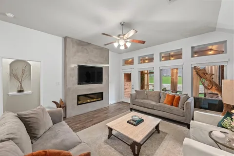 a front view of a house with a yard table and chairs